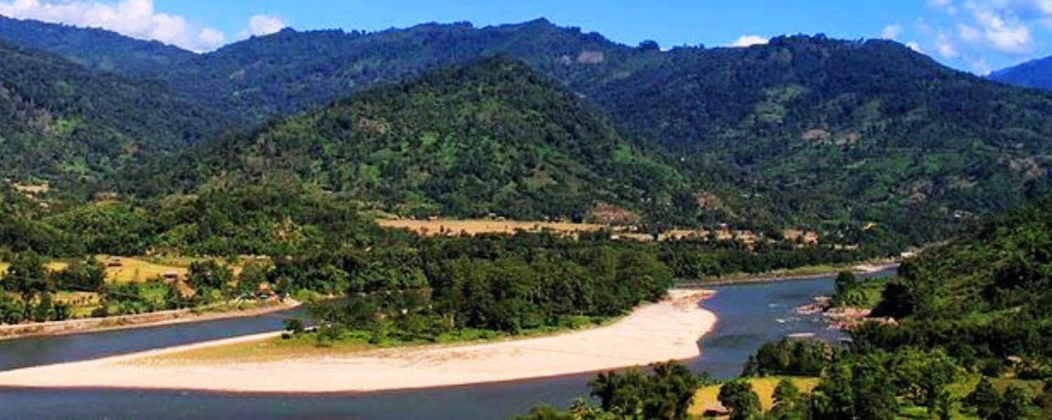 Discover a hidden gem in Daporijo, Arunachal Pradesh, with this enchanting image of a cascading waterfall 