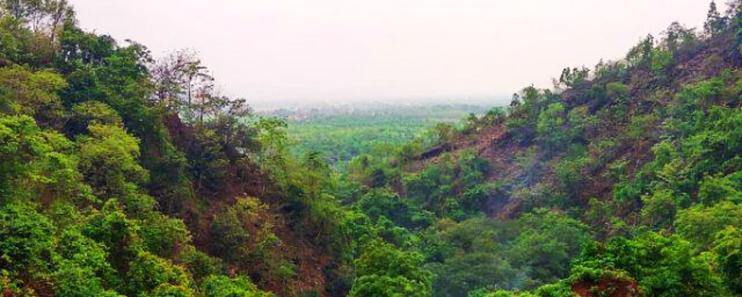 Thrilling aerial view of Kakolat Hills showcasing its breathtaking beauty, with cascading waterfalls, lush greenery, and majestic cliffs